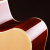 竹霖生ギターの角が欠けている民謡木吉は初心者入門楽器40寸の原木色です。